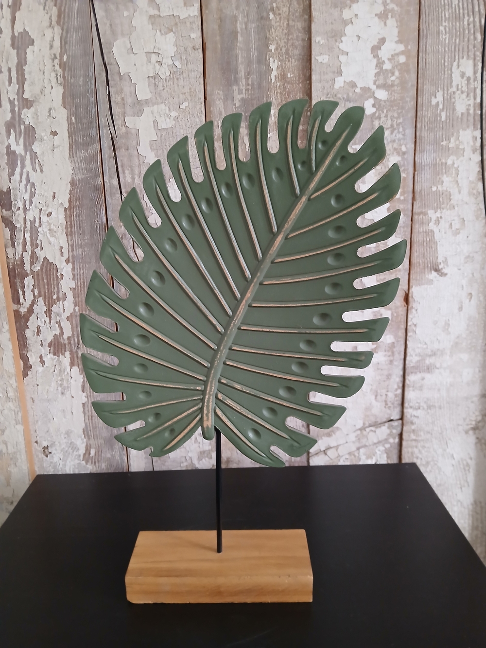 Decorative Green Monstera Leaf Sculpture on Wooden Base